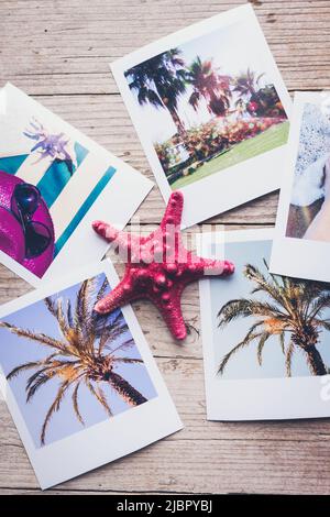 Stack of vacation holiday tropical printed pictures on wooden background. Happy memories concept. All photos belong to me. Top view. Stock Photo