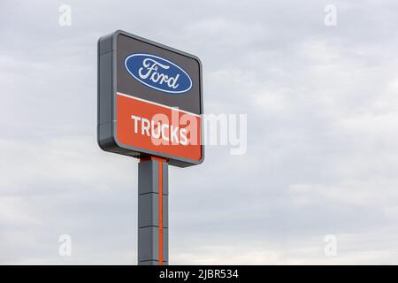 Ford trucks sign. Ford Motor Company Stock Photo