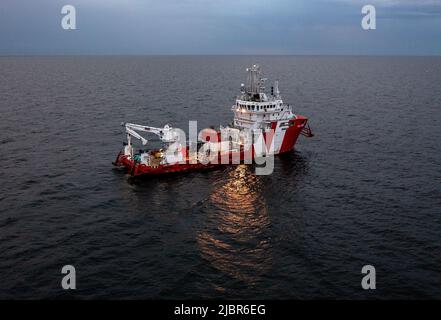 A new survey of M/S Estonia began on Tuesday, June 07, 2022, on board VOS Sweet in the Baltic Sea. Using a ROV (remotely operated vehicle), a photogrammetric survey will be carried out and then be made into a 3D model to inspect the damage to the ship. 852 people died when MS Estonia sank on September 28, 1994, during a crossing from Tallinn, Estonia, to Stockholm, Sweden. Pic: At 21.00, one minute of silence was observed. Photo Stefan Jerrevang / TT code 60160 Stock Photo