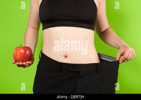 Close-up green sport pants, sweatpants, jogging for men isolated on white  background Stock Photo - Alamy