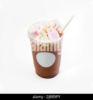 Cool delicious milkshake with chocolate flavor and whipped cream with souffle. Close-up, on a white background. Mock up. Stock Photo