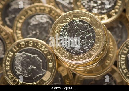 File photo dated 26/01/18 of British one pound coins. The UK's economic growth is expected to be slower than first thought this year and will stagnate in 2023, experts at the Organisation for Economic Co-operation and Development (OECD) have warned. Issue date: Wednesday June 8, 2022. Stock Photo