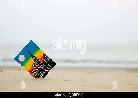 Travel painting in beach sand, Ratnagiri, Maharashtra, India Stock Photo