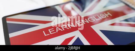 Screen tablet device shows learning english language online program Stock Photo