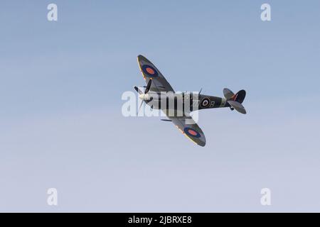 Supermarine Spitfire aerial display over the town of Cromer Norfolk to celebrate the Platinum Jubilee June 2022 Stock Photo