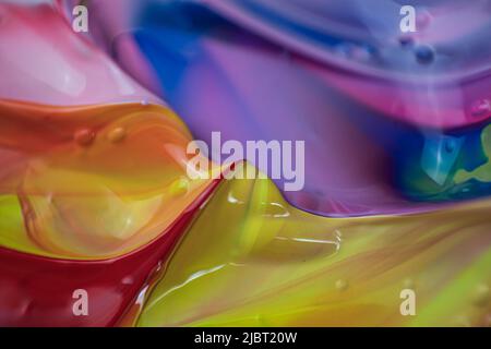 A very colored texture made with acrylic paint perfect for a background made of several colors of painting. Stock Photo