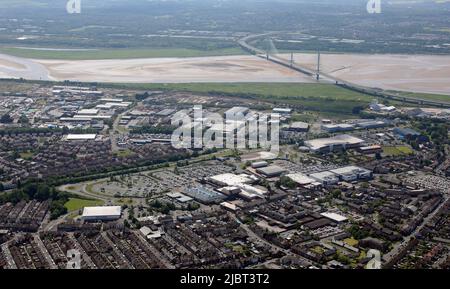 aerial view of Widnes, Cheshire looking south towards Runcorn across the Mersey Estuary Stock Photo