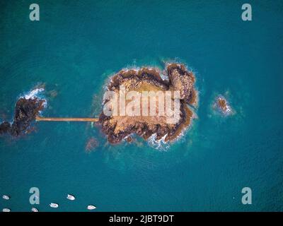 France, Côtes d'Armor, Bay of Saint Brieuc, Saint Quay Portrieux, view from above on the islet of Saint-Marc surrounded by the sea (aerial view) Stock Photo