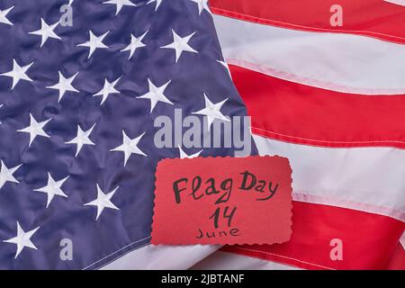 Flag day 14th june concept. American flag with stripes and stars. Top view flat lay. Stock Photo