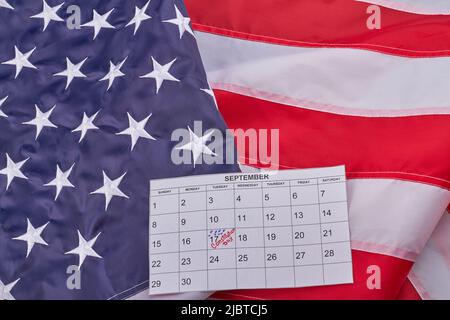 September seventeenth constitution of the United States concept top view. Banner with fabric flag with stripes and stars. Stock Photo