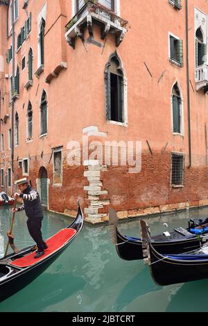 Italy, Venetia, Venice, listed as World Heritage by UNESCO, Castello district, Fondamenta del Osmarin, Gondolier Stock Photo