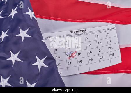 Constitution day of the United States 17th september top view flat lay. Fabric US flag with calendar. Stock Photo