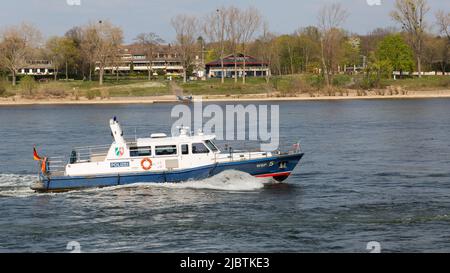 Bonn, Germany - Mar 30, 2022: Police boat patroling the Rhine river. Stock Photo