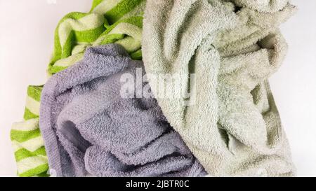 old towels on white background - top view Stock Photo