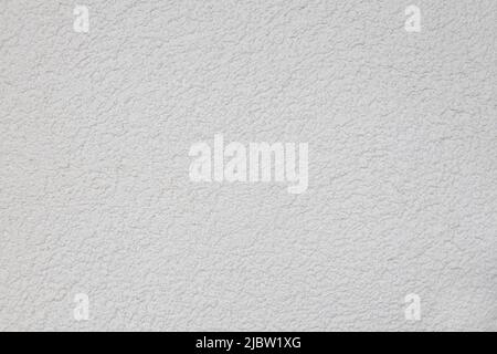 Texture of white concrete plaster. Decorative plaster. Structural wall. Stock Photo