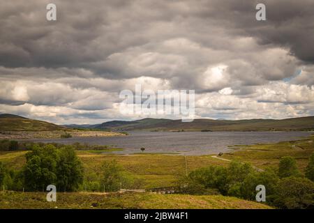 A cloudy summer landscape HDR image of Loch Naver, western end, in Mackay Country, Sutherland, Scotland. 31 May 2022 Stock Photo