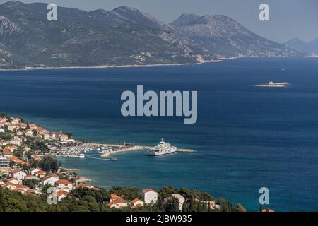 Harbor and Jadrolinja Ferry to Korcula seen from Above Orebic on the Peljesac Peninsula, Croatia Stock Photo