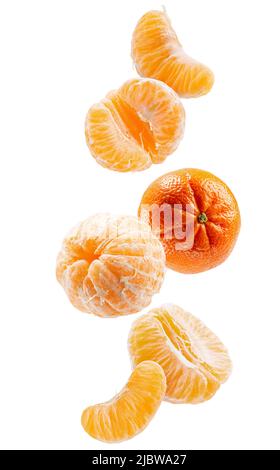 falling tangerines with clipping path isolated on a white background. Stock Photo