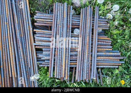 Pile of iron, metal wire rod or coil background for Construction