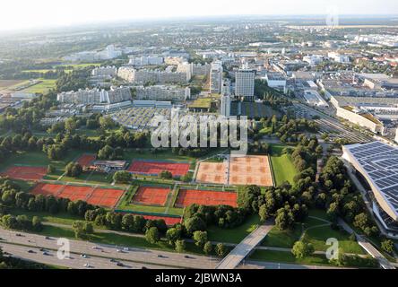 Munich, Munich, Germany - August 25, 2021: Incredible birds-eye view of the tennis courts and houses and homes seen from the top of the old Olympic Vi Stock Photo