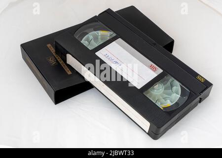 Old video cassette on white isolated backgorund with text space. Stock Photo