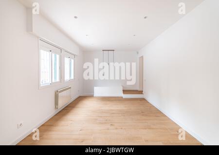 Empty apartment room with wooden floor in a new flat for rent Stock Photo