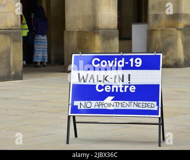 Sign for walk in centre to get vaccine to protect against Covid-19 or Covid or Coronavirus at the Town Hall in Manchester, England, United Kingdom. Stock Photo