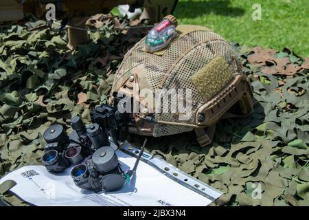 Armed forces, special operations helmet with military vision goggles. Night vision for special operations by armed forces. Military gear. Stock Photo