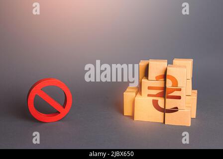 Ukrainian hryvnia goods boxes and prohibition symbol NO. Ban on import goods. Impossibility of transportation, oversupply. Sanctions and embargoes. Sh Stock Photo