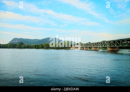 River with mountain and bridge in background, Mont St-Hilaire, Quebec, Canada Stock Photo