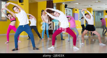 Teenagers practicing dance in studio Stock Photo
