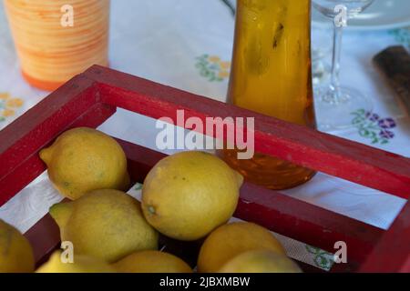 Group of sicilian lemons on a basket table. Stock Photo
