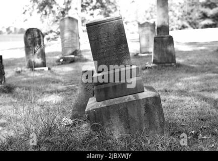 The broken gravestone. Stock Photo