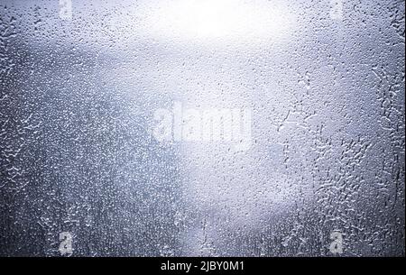 Ice frozen on a window during a snow storm in Dallas, Texas. Stock Photo