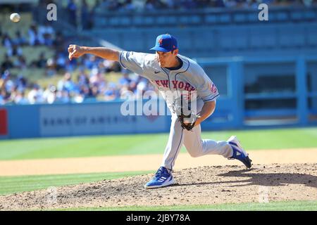 New York Mets pitcher Seth Lugo catches a ball during spring training ...