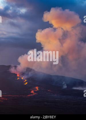 Crater eruption and glowing river of magma from Fagradalsfjall Volcanic eruption at Geldingadalir, Iceland Stock Photo