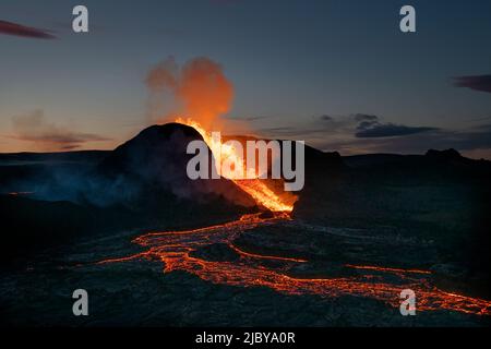 Reykjanes Peninsula, Iceland - May 9th 2021: Geldingadalir eruption at dusk with a lava flow Stock Photo