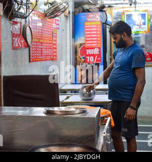 Old Delhi, India – April 15, 2022 - Portrait of shopkeepers or street vendors in Chandni Chowk market of Delhi, Old Delhi Street Photography Stock Photo