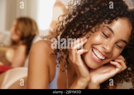 Mixed race woman laughing Stock Photo