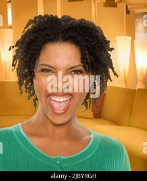 Laughing African American woman Stock Photo