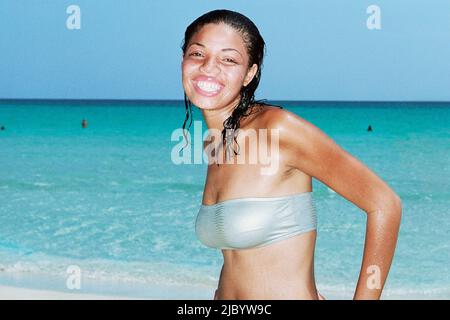 Young woman enjoying beach Stock Photo