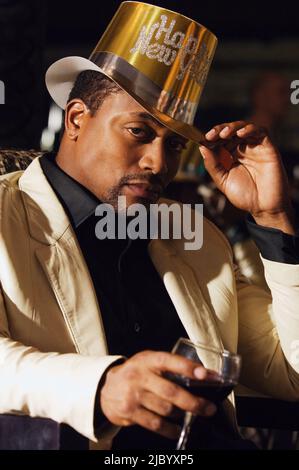 Portrait of African man at New Year's Eve party Stock Photo