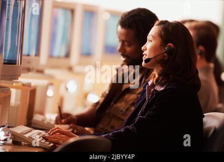 Multi-ethnic businesspeople working in call center Stock Photo