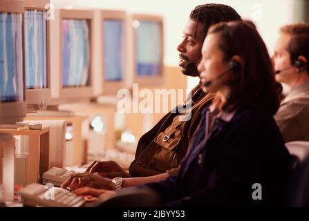 Multi-ethnic businesspeople working in call center Stock Photo