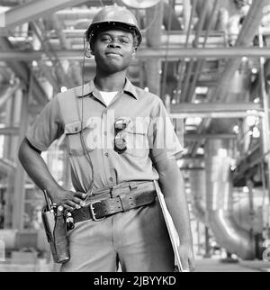 African American male welder with clipboard Stock Photo