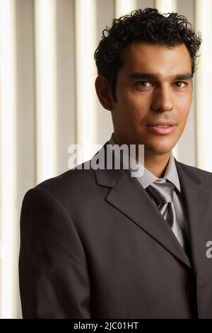 Close up of Hispanic businessman Stock Photo