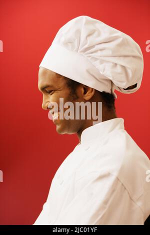 Side view of male chef wearing hat Stock Photo