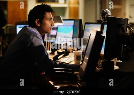 Middle aged businessman working at his desk Stock Photo
