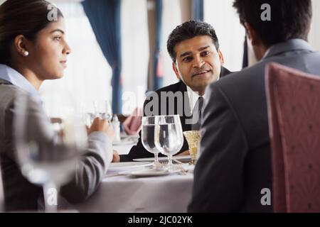 Businesspeople having a meeting at a restaurant Stock Photo