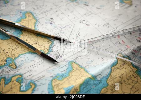 Compass resting on Europe map, yellow stars marking spots Stock Photo ...